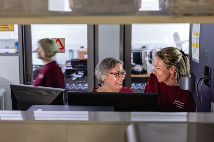 Smiling scientists at work